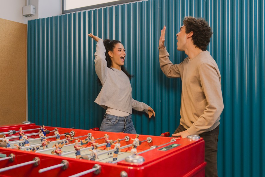Students enjoying student life at ONIX student residence in Barcelona with shared spaces and community